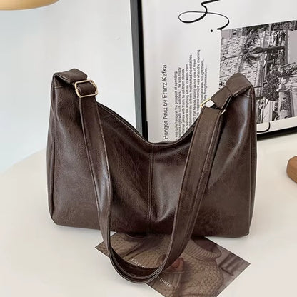 Bolso tote vintage de cuero PU para mujer, elegante y casual, gran capacidad, estilo Maillard y opción de uso cruzado.